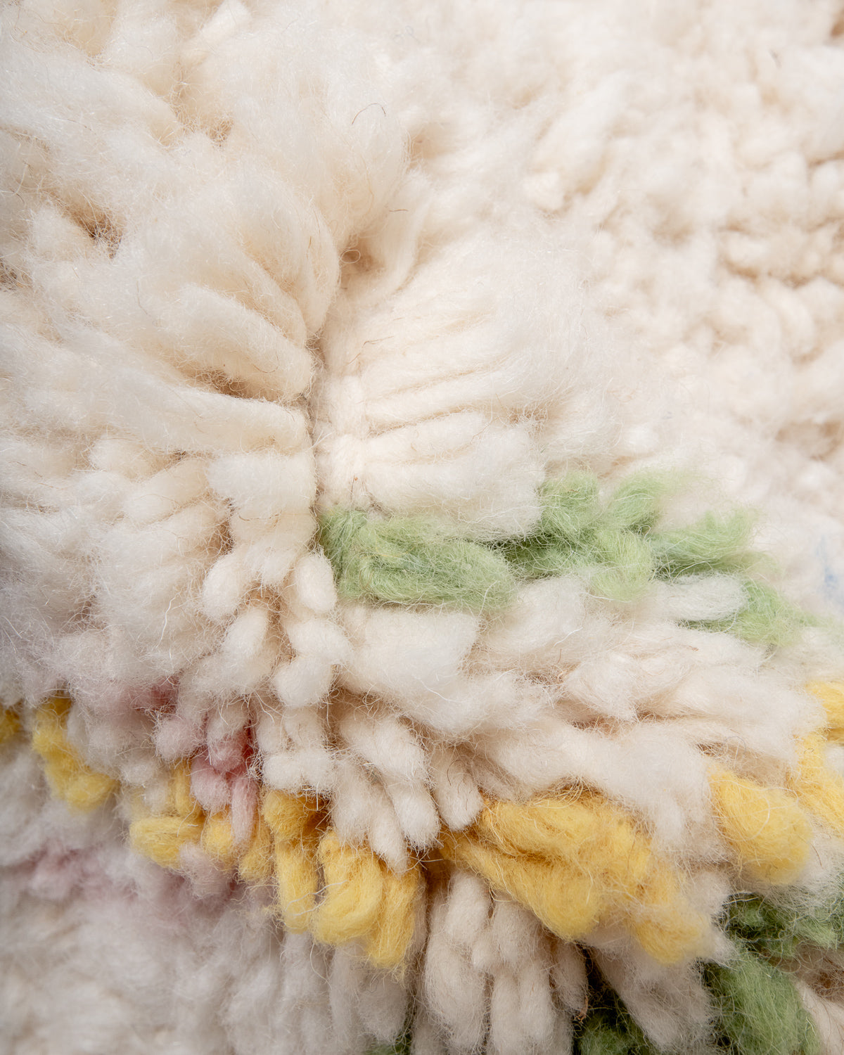 Modern, designer, handcrafted Berber rug from Morocco. Beniourain carpet with beautiful colours and patterns and fluffy wool texture.
